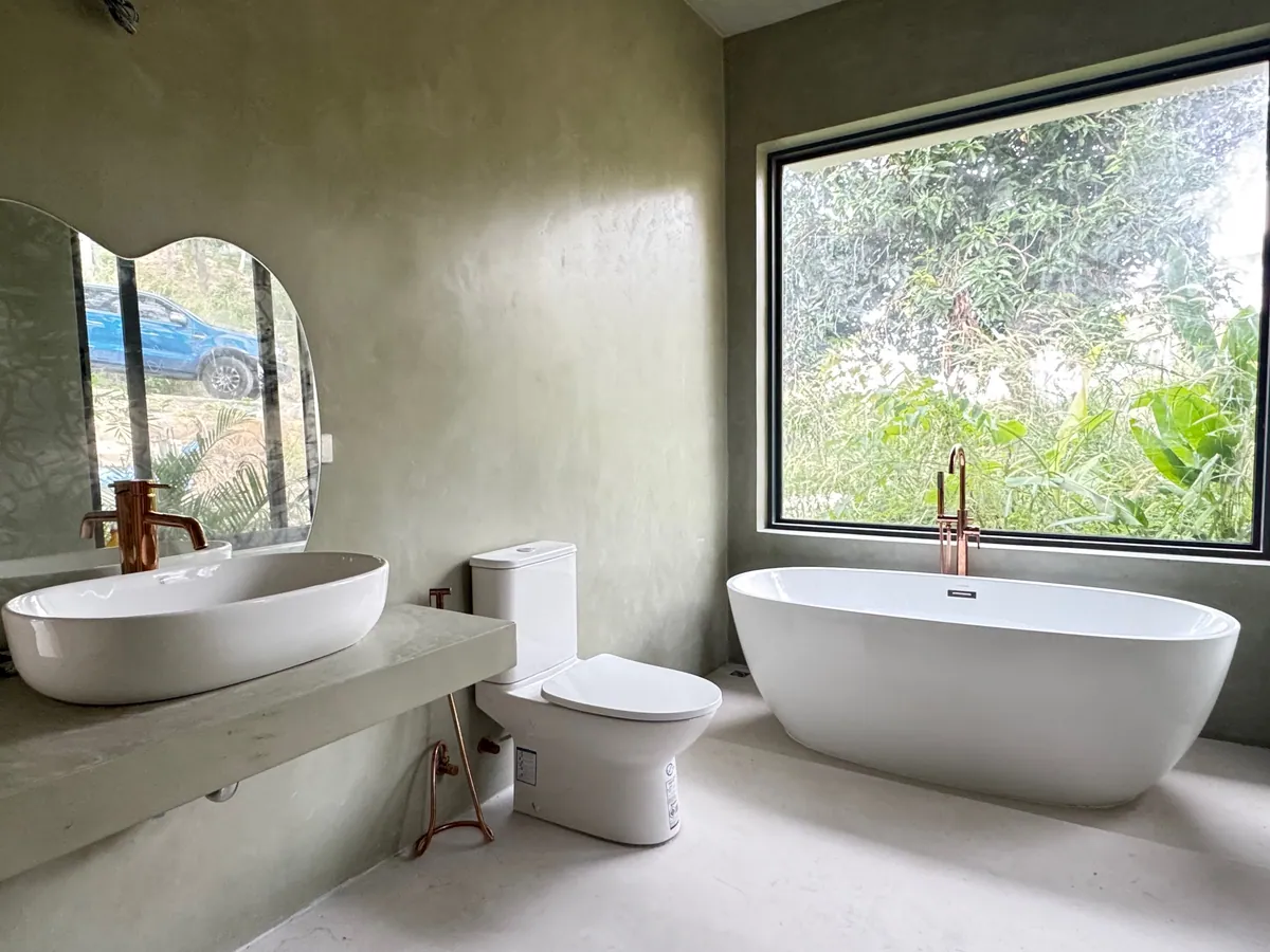 Sage · Full bathroom with freestanding bath